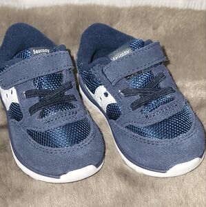 NWOT Saucony toddler/baby sneaker.  Navy blue.  Size 4 X wide.  Velcro closure